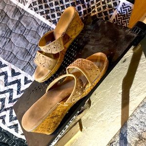 I am selling these worn wedged sandals